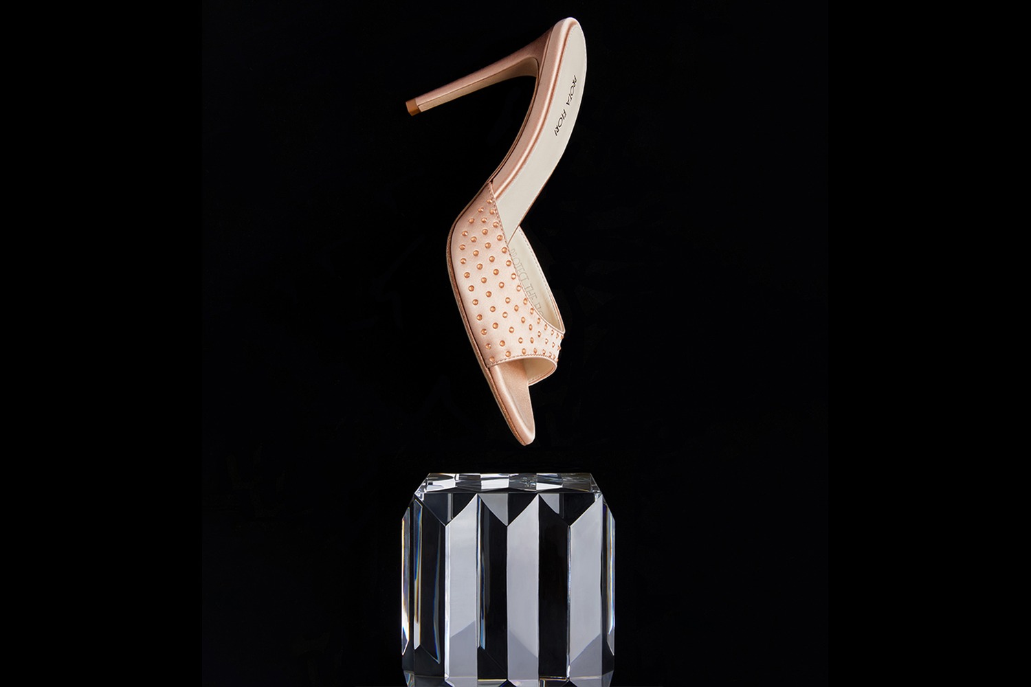 Tulipana Scintelle sandal on a crystal plinth